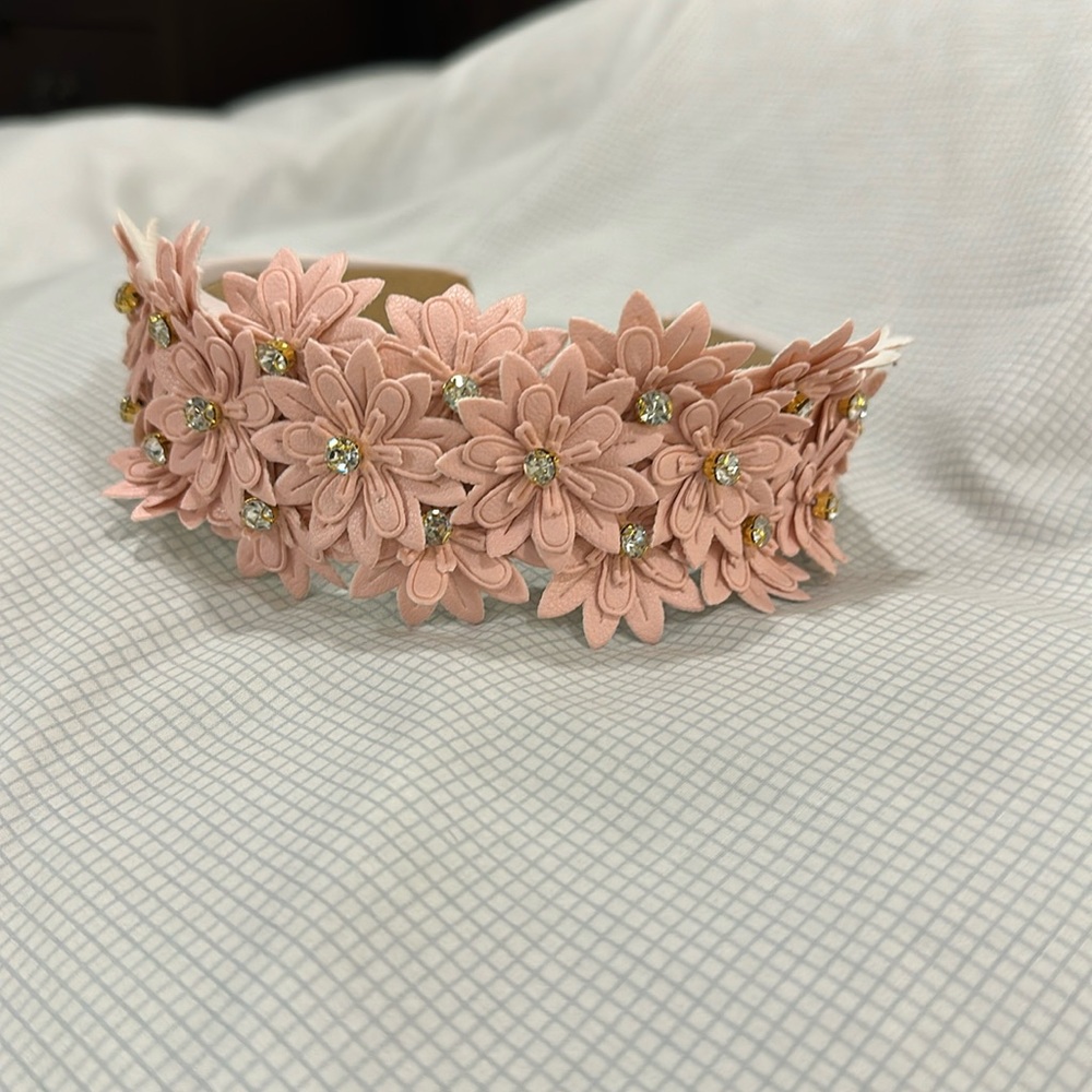 Beautiful pink floral head band with rhinestones.